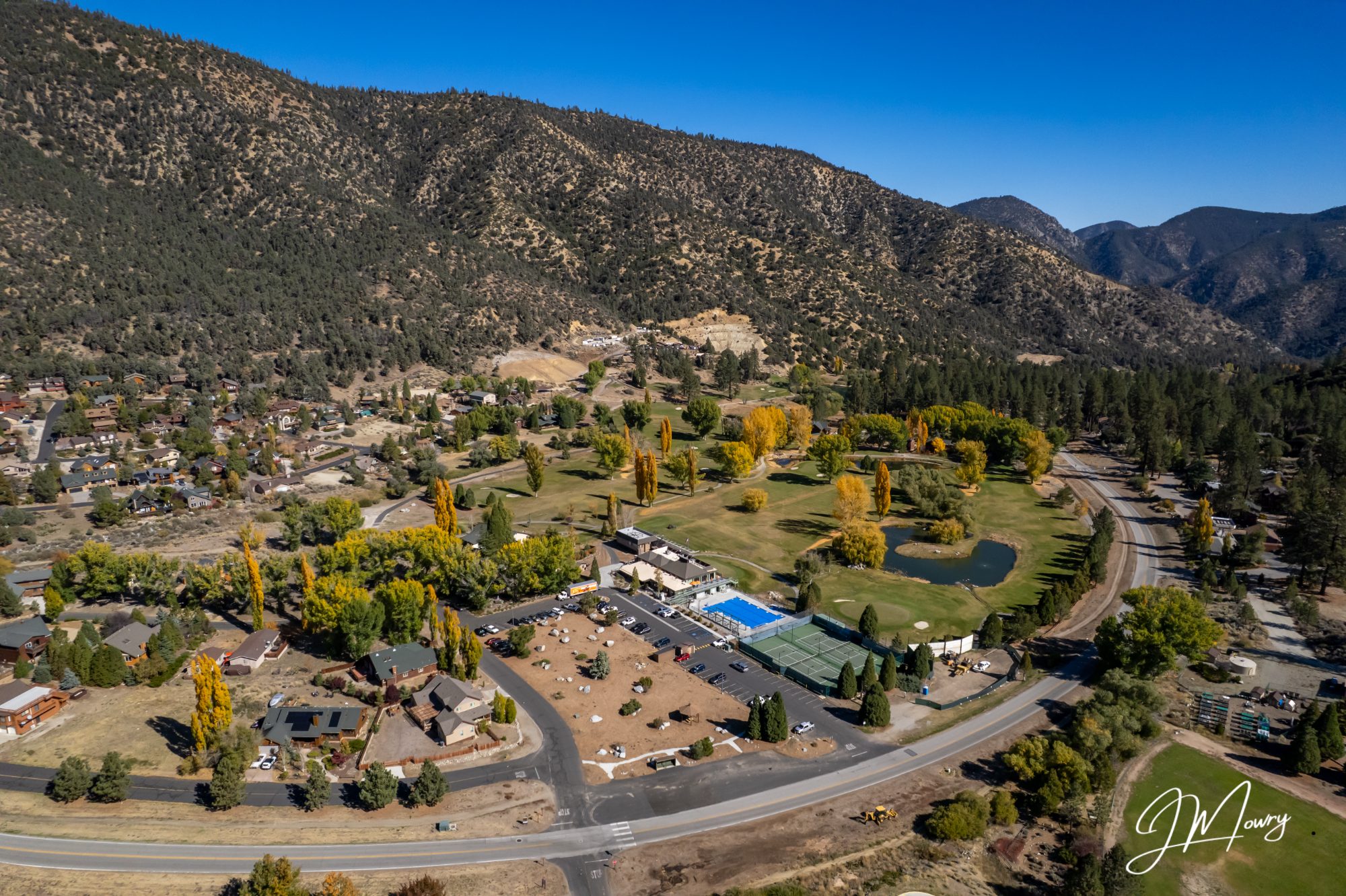 Autumn aerial over the clubhouse, pool and fairways
