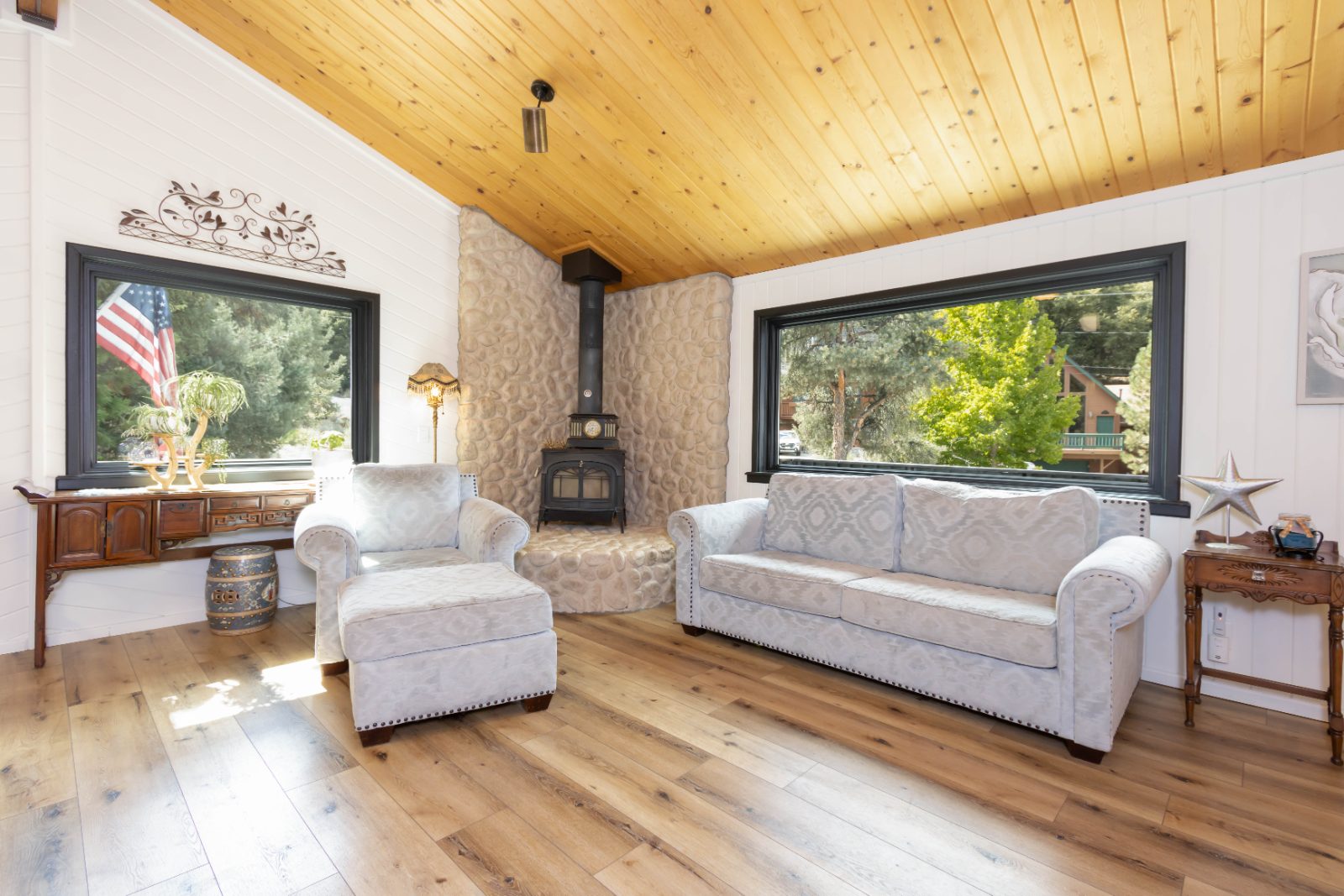 Vaulted living room with wood ceiling